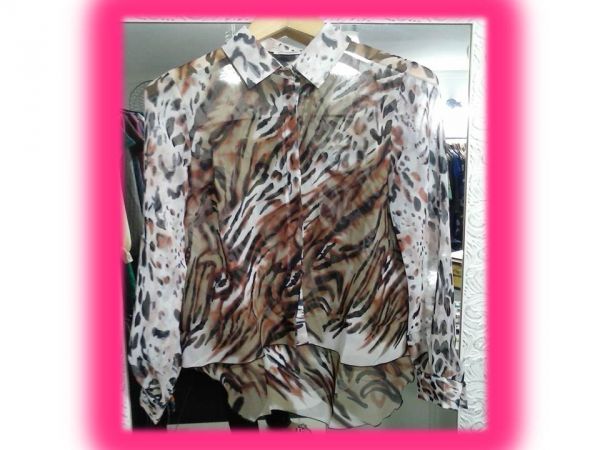 Camisa Animal Print.